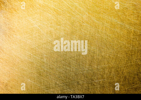 flat matte brushed brass texture with random pattern and light gradient Stock Photo