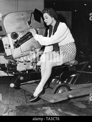 GREER GARSON circa 1945 Pin-Up Publicity Portrait with Movie Camera Metro Goldwyn Mayer Stock Photo