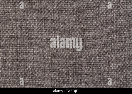 Structure of the ginger cloth with natural texture. Cloth backdrop. The texture of gray fabric textile upholstery of furniture. Stock Photo