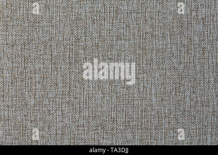 Structure of the ginger cloth with natural texture. Cloth backdrop. The texture of gray fabric textile upholstery of furniture. Stock Photo