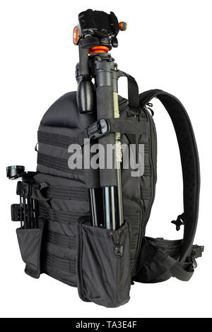 Black professional tactical molle black photo backpack with tripod and panoramic head isolated on white background. Stock Photo