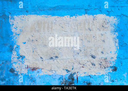 Blue plsater wall with black mold background and white rectangular on it. Stock Photo