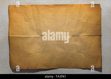 single old folded flat sheet of paper Stock Photo