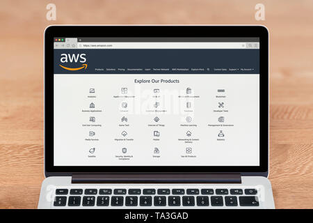 An Apple Macbook displays the Amazon Web Services (AWS) website (Editorial use only). Stock Photo
