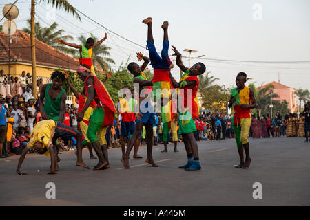 Bissau, Republic of Guinea-Bissau - February 12, 2018: Group of boys performing during the Carnival Celebrations in the city of Bisssau. Stock Photo