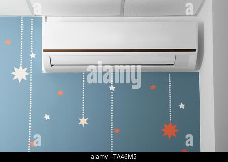 Modern air conditioner on wall Stock Photo