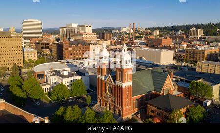 Rich late afternoon light falls onto the buildings and architecture of Spokane Washington USA Stock Photo