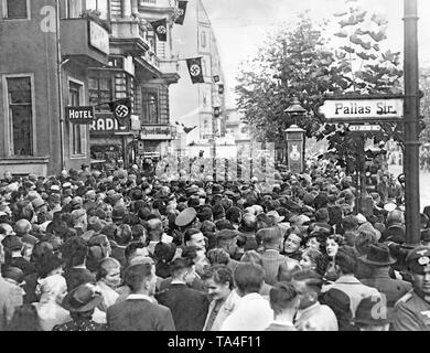 Waiting visitors in front of the Sportpalast in Berlin on September 26, 1938. They are listening to a speech held by Adolf Hitler concerning the occupation of the Sudetenland by German troops. Stock Photo