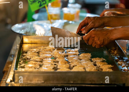 Kanom Krok, a popular Thai dessert street food on Phuket Island in Thailand, Asia Stock Photo