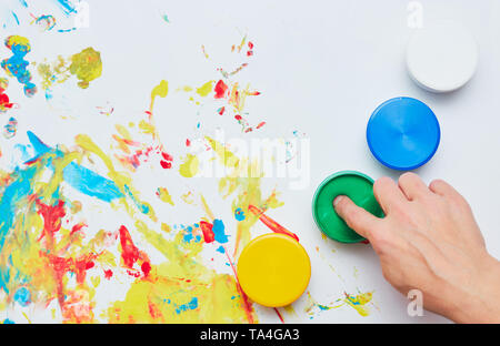 a child draws. a child's drawing inks, finger paints, hand prints Stock Photo