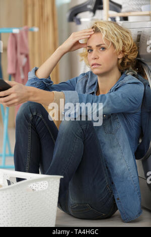 unhappy stressed woman showing signs of fatigue Stock Photo