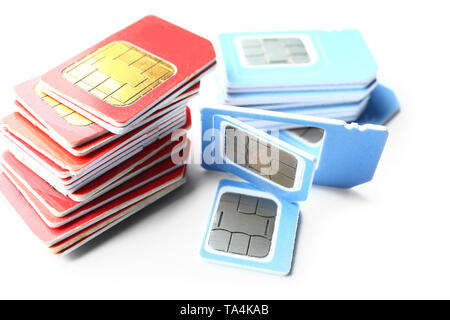 Different sim cards on white background Stock Photo