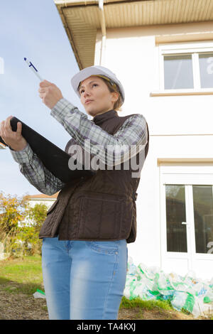 female foreman inspecting the area Stock Photo