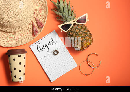 Pineapple with stylish sunglasses, calendar, cup of coffee and female items on color background Stock Photo