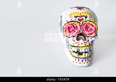 Painted human skull for Mexico's Day of the Dead on white background Stock Photo