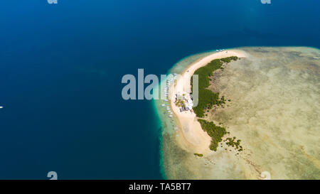 Starfish Island, Puerto Princesa, Palawan. Island hopping Tour at Honda Bay, Palawan. An island of white sand with mangroves. Atoll with a white island, view from above. Stock Photo