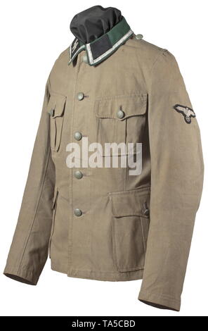 A tunic M 36 for an SS-Unterscharführer private purchase piece Light summer issue in thin brownish-green cotton with field-grey metal buttons and dark green collar. Silver NCO braid, black collar tabs, the right side with runes in silver-grey RZM embroidery, rank designation missing. Machine-embroidered sleeve eagle on a black base. historic, historical, 20th century, 1930s, 1940s, Waffen-SS, armed division of the SS, armed service, armed services, NS, National Socialism, Nazism, Third Reich, German Reich, Germany, military, militaria, utensil, piece of equipment, utensils,, Editorial-Use-Only Stock Photo