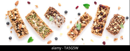 Granola bars assortment isolated on white background, banner. Homemade healthy snack - granola superfood bars. Stock Photo