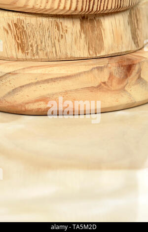 Wooden pyramid from processed wood of different textures close-up macro photo background Stock Photo