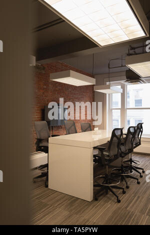 Empty chairs and table at conference room Stock Photo
