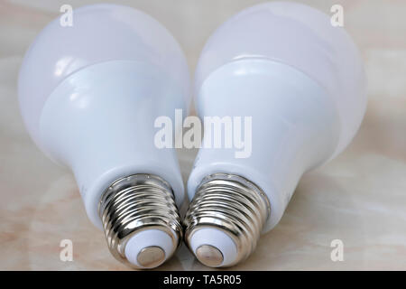 Lighting electric lamps for living rooms LED close-up lie on the table Stock Photo