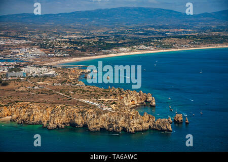 Ponta da Piedade. From left to right Praia do Camilo, Dona Ana and Pinhao beach. In the backgroud Praia de San Roque. Faro. Algarve. Portugal Stock Photo