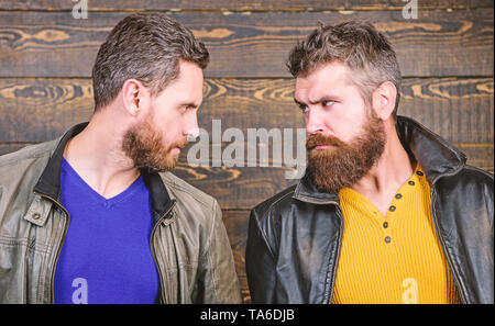 Confident competitors strict glance. Masculinity concept. Masculinity attributes. Brutality confidence and masculinity interconnection. True man temper. Men brutal bearded hipster. Exude masculinity. Stock Photo