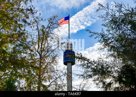 Orlando, Florida. December 19, 2018. Top view of Sky Tower, USA Flag and Trees at Seaworld in International Drive area. Stock Photo