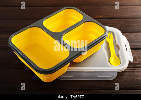 Empty school lunch box on wooden background Stock Photo