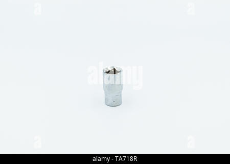 This capture of a silver socket wrench on a white background and in a studio light Stock Photo