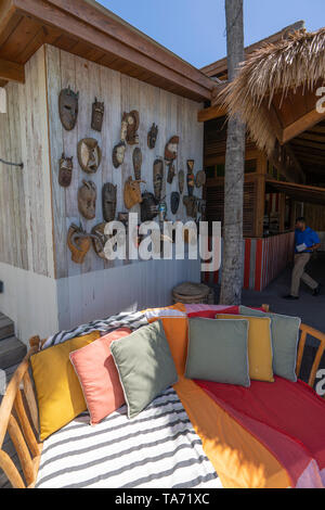 Lovell Village, Mustique Island, St Vincent and the Grenadines, West Indies, Caribbean. Luxury Travel Destination with Azure blue waters and sky. Stock Photo