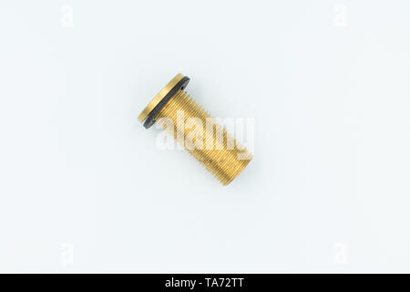 This is a capture for a yellow and silver pipe valve fitter with a white background and studio light Stock Photo