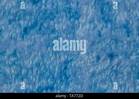 A seamless texture of synthetic cyan polyester soft furniture upholstery with random blots pattern Stock Photo