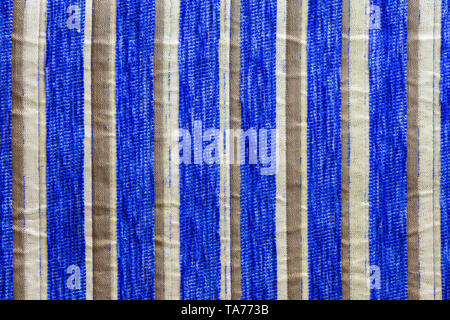 striped synthetic woven upholstery fabric close-up texture and background Stock Photo