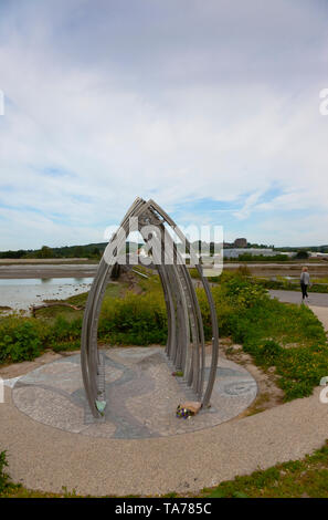 England, West Sussex, Shoreham-by-Sea, Air crash memorial sculpture by artists Jane Fordham and David Parfitt and positioned on the bank of the river Adur by the footbridge to the airport. Stock Photo