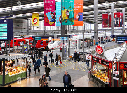 MUNICH, GERMANY - Munich central station departure and arrival hall with food kiosks Stock Photo