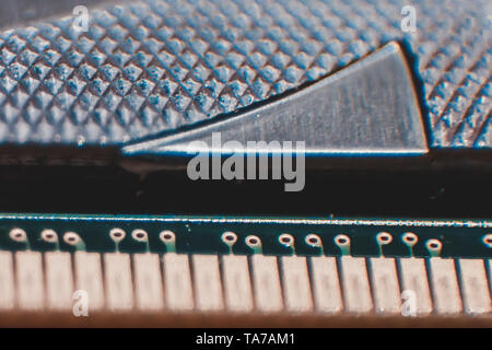Gold Contact pins on DDR3 DIMM memory module for desktop pc computer, allow processor to access the data that needs to be process quickly Stock Photo