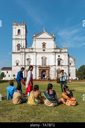 Group of Indian tourists in front of Se Cathedral, Old Goa, India Stock Photo