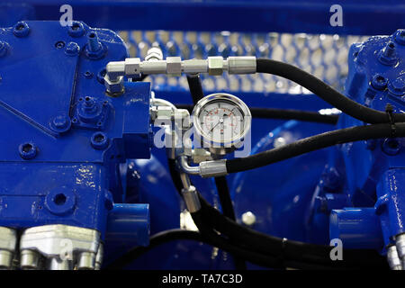 Close up view of air compressor with pressure gauge. Selective focus. Stock Photo