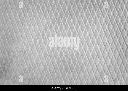 Rough gray concrete slab with diamond pattern close up. Industrial texture and background Stock Photo