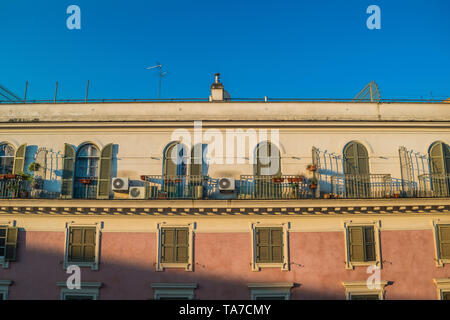 Photograph of an apartment facade, highlighting its balconies and windows Stock Photo