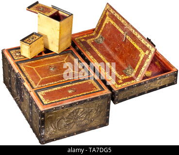 A Dutch writing casket with several secret compartments, circa 1680 Rectangular, wooden casket with riveted, iron bands. The exterior completely covered with ornamentally chased brass sheet. Obverse lock with hasp (key added), movable handle at top. The interior of the lid with hinged drawer for letters made of embossed leather. Body of softwood, the upper layer with five small removable boxes, either one with leather covered lid and pull ring. Underneath another layer with three drawers which are only accessible by raising the side partitions. D, Additional-Rights-Clearance-Info-Not-Available Stock Photo