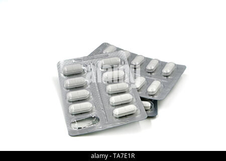 white pills in blister packs isolatet on white background Stock Photo