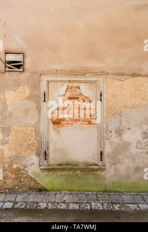 Window bricked up with bricks, Germany Stock Photo