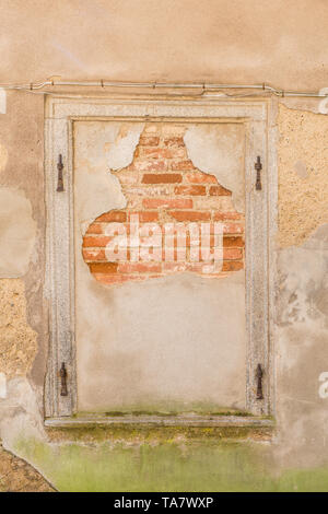 Window bricked up with bricks, Germany Stock Photo