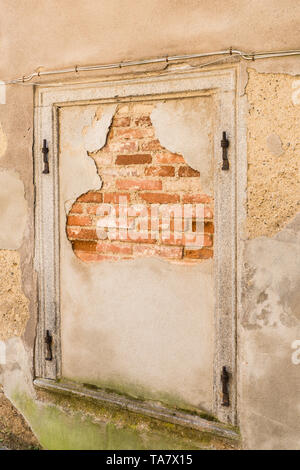 Window bricked up with bricks, Germany Stock Photo