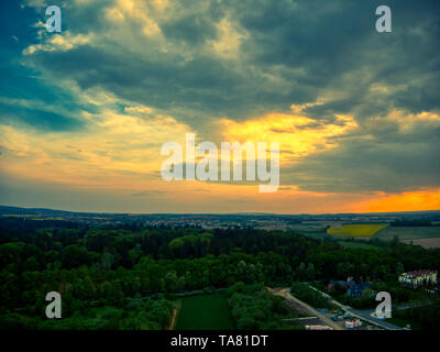 aerial sunny day rain clouds forming over farms and fields Stock Photo