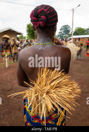 Young Senufo woman dancing the Ngoro during a ceremony, Savanes district, Ndara, Ivory Coast Stock Photo