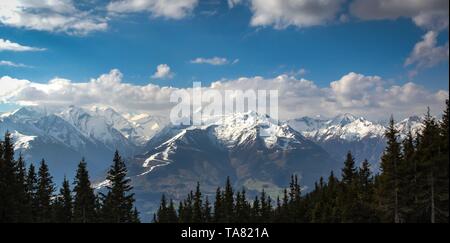 Snow disappearing in Austrian alps in the spring Stock Photo