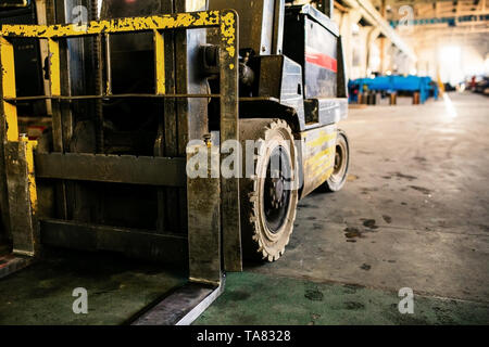 Closeup Old forklift in the manufacturer. forklift in the enterprise Stock Photo